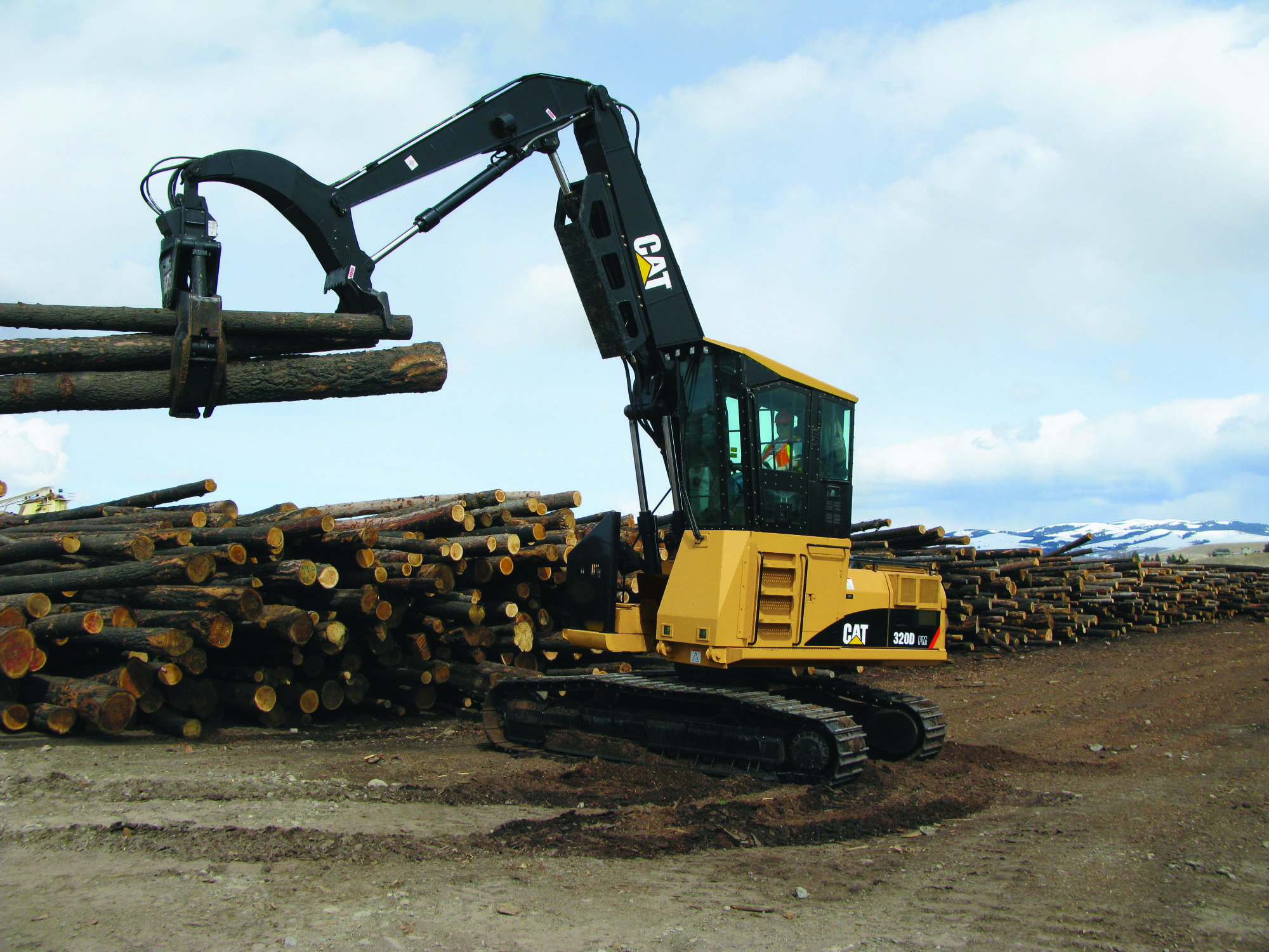 CAT equipment moving timber