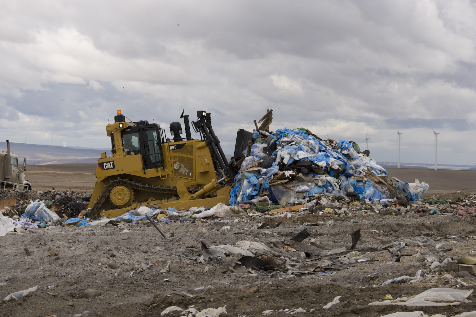 CAT equipment moving scraps