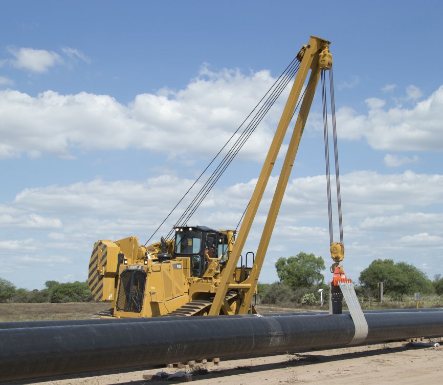 CAT equipment laying pipes