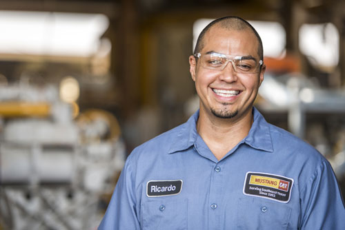 Mustang CAT employee smiling